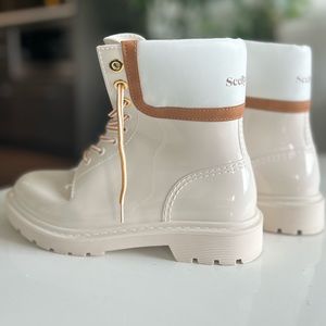 SEE BY CHLOE.FLORRIE. Waterproof ankle-high rubber boots, printed heel logo, 39